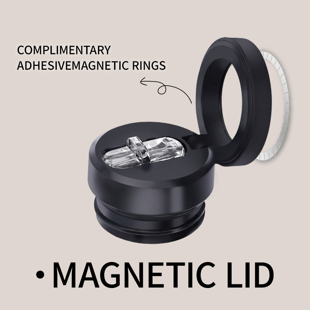 Black magnetic lid with clear adhesive magnetic rings on a beige background