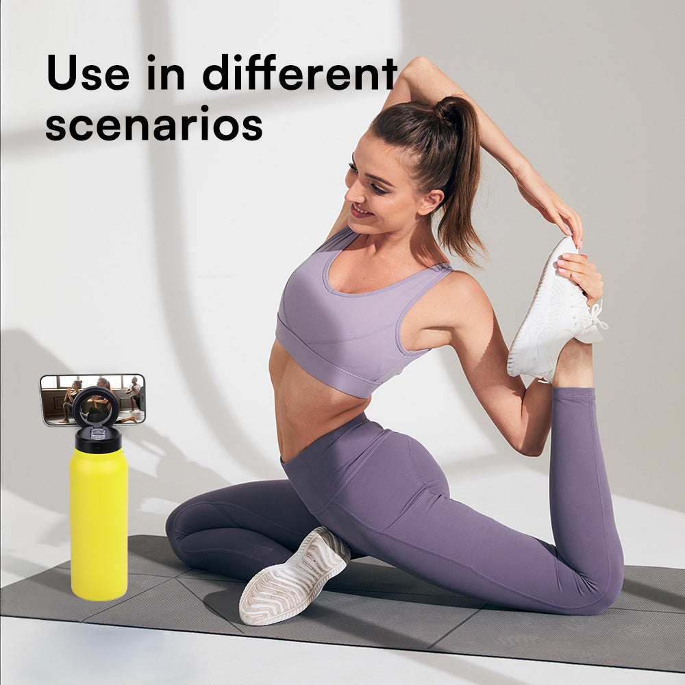 Woman in purple athletic wear stretching on a mat with a yellow water bottle beside her, against a white background.